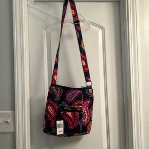 Two Vera Bradley crossbody bags.